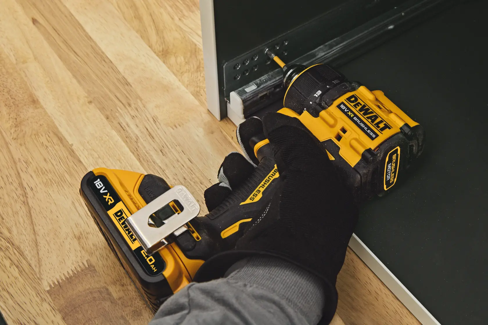 DEWALT 18V XR compact drill with four heads, LED light, attachment organiser, and belt hook.